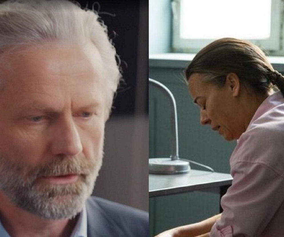 Portret Arkadiusza Głogowskiego jako prezesa Baczewskiego w ciemnej marynarce obok Anny Muchy w roli Magdy w różowej koszuli, siedzącej przy stole, odzwierciedla emocje z serialu M jak miłość. Więcej o losach bohaterów przeczytasz na Super Seriale.