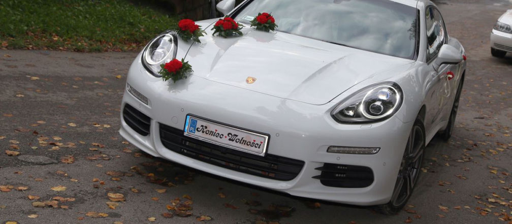 Kolarz Rafał Majka pojechał do ślubu Porsche Panamera
