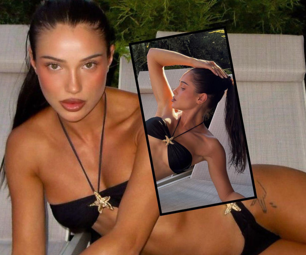 Opalona Natsu wyleguje się na leżaku w czarnym bikini