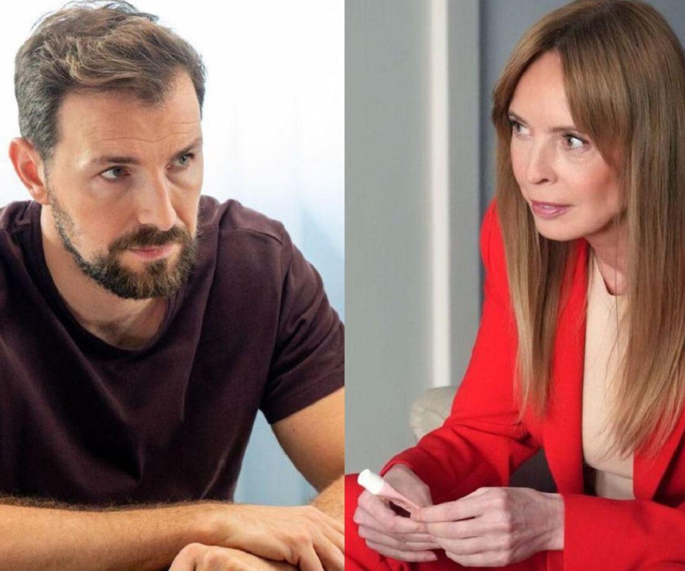 Łukasz Sadowski z brodą i wąsami, w ciemnej koszulce, z zamyśloną miną oraz Agnieszka Olszewska w czerwonej marynarce, trzymająca w dłoniach mały przedmiot. Zdjęcie ilustruje intrygi i dramatyczne wydarzenia z serialu Barwy szczęścia dostępne na stronie Super Seriale.