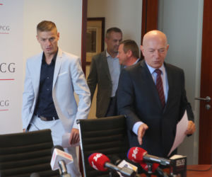 Konferencja, Tomasz Komenda