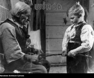 Stary góral i chłopiec podczas plecenia rózgi na Wielkanoc (1944)