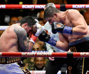 Ukraine's Oleksandr Usyk throws a flurry of punches at Netherlands' Rico Verhoeven