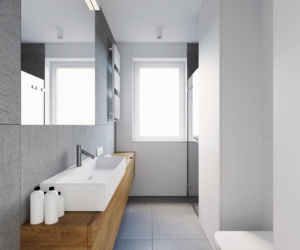 Beton, biel i drewno w łazience