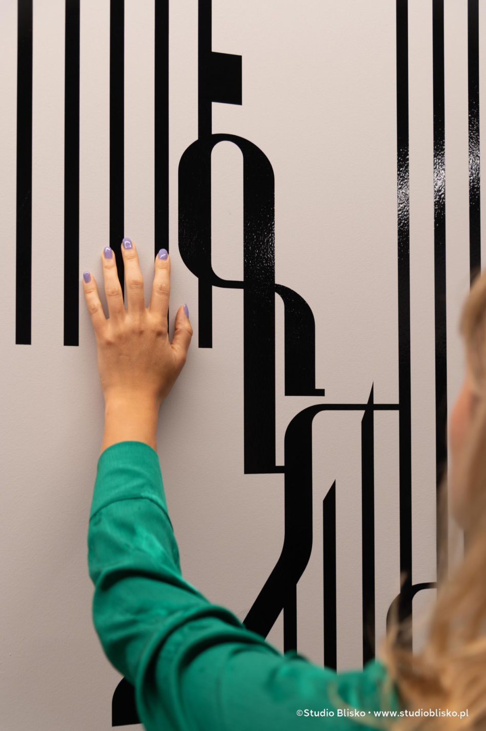 Wayfinding dla apartamentów Naturia w Toruniu 