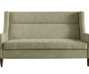 Zielona sofa z wysokim oparciem