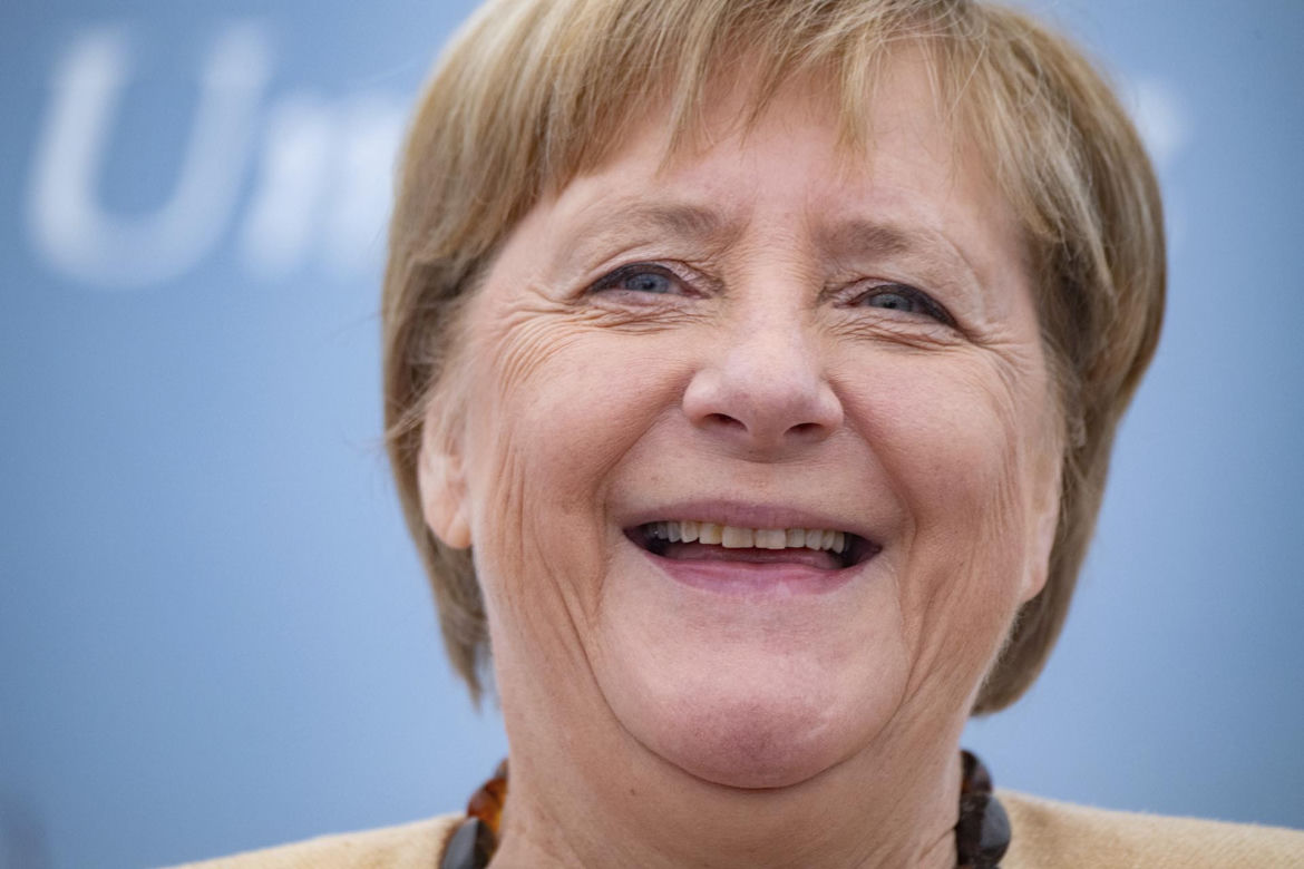 Merkel obsiadły papugi