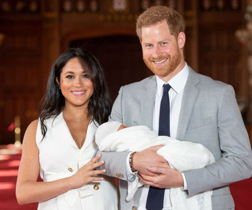 Książę Harry i Meghan Markle z dzieckiem
