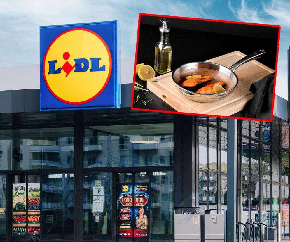 Elewacja sklepu Lidl z widocznym logo marki oraz powiększonym kadrem patelni z łososiem, cytrynami i rozmarynem na desce do krojenia, obok butelki z oliwą. Ofertę premium Lidla, polecaną przez Karola Okrasę, można przeczytać na Super Biznes.
