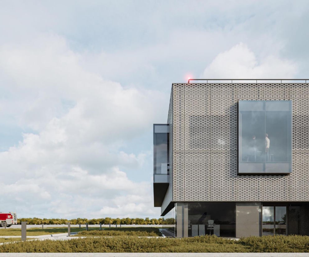 Nowoczesna strażnica z wozem bojowym w tle. O budowie baz straży pożarnej Port Polska przeczytasz na Architektura.