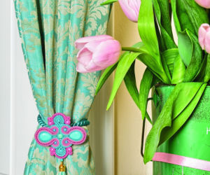 Dekoracyjna klamra do zasłon z nitek soutache