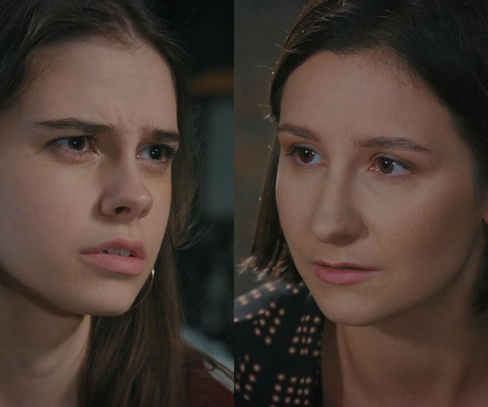 Basia (Karina Woźniak) z gniewną miną i Agnes (Amanda Mincewicz) ze zmartwioną twarzą w scenie konfrontacji. Zdjęcie przedstawia intensywny moment, gdzie obie bohaterki serialu M jak miłość wyrażają swoje emocje, co jest kluczowe dla fabuły odcinka 1895. Więcej o dramatycznych wydarzeniach w Super Seriale.