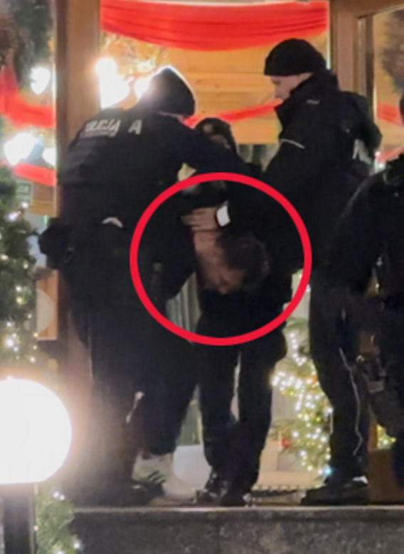 Daniel Martyniuk skuty w kajdanki i wyprowadzony z hotelu