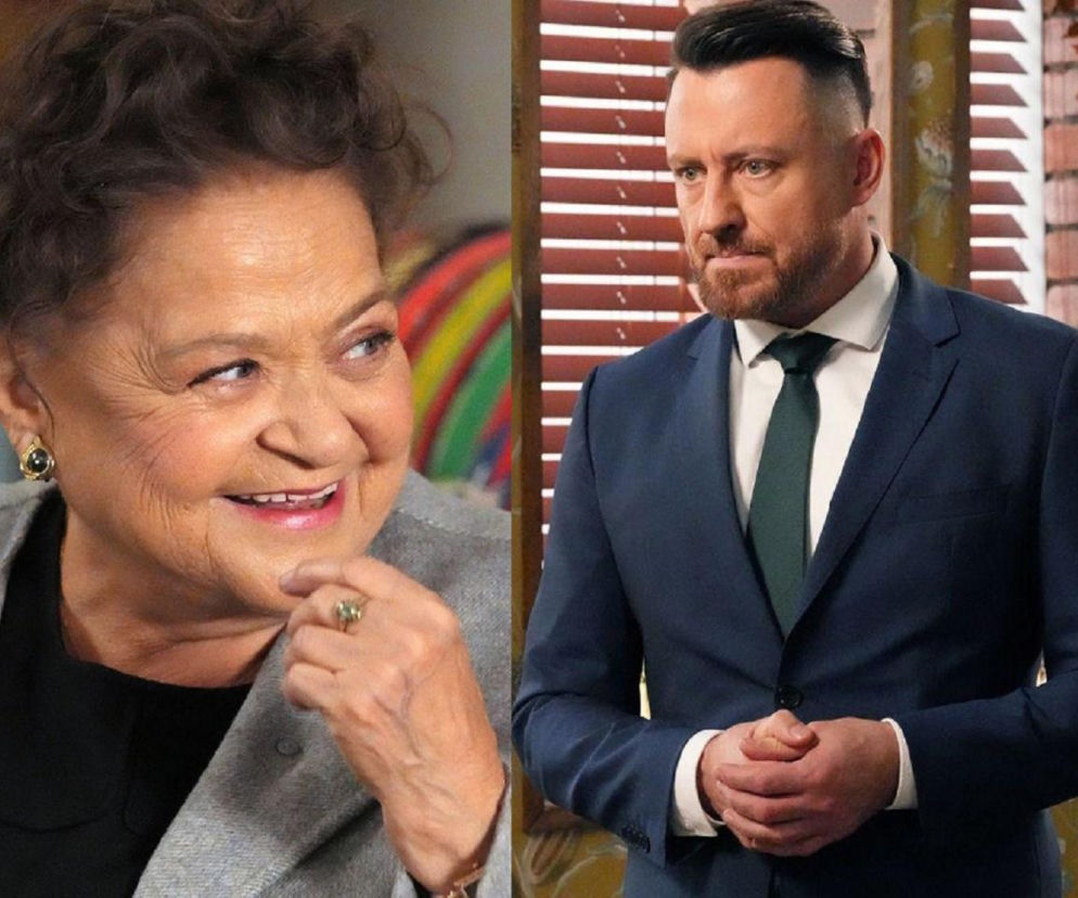 Grażyna Zielińska jako Lucyna i Adam Szczyszczaj jako Maciej Wilk z serialu Barwy szczęścia w zbliżeniu na twarze. Lucyna uśmiecha się, opierając dłoń o brodę. Maciej w garniturze patrzy w dal, stojąc na tle ceglanej ściany. O najnowszych odcinkach przeczytasz na Super Seriale.