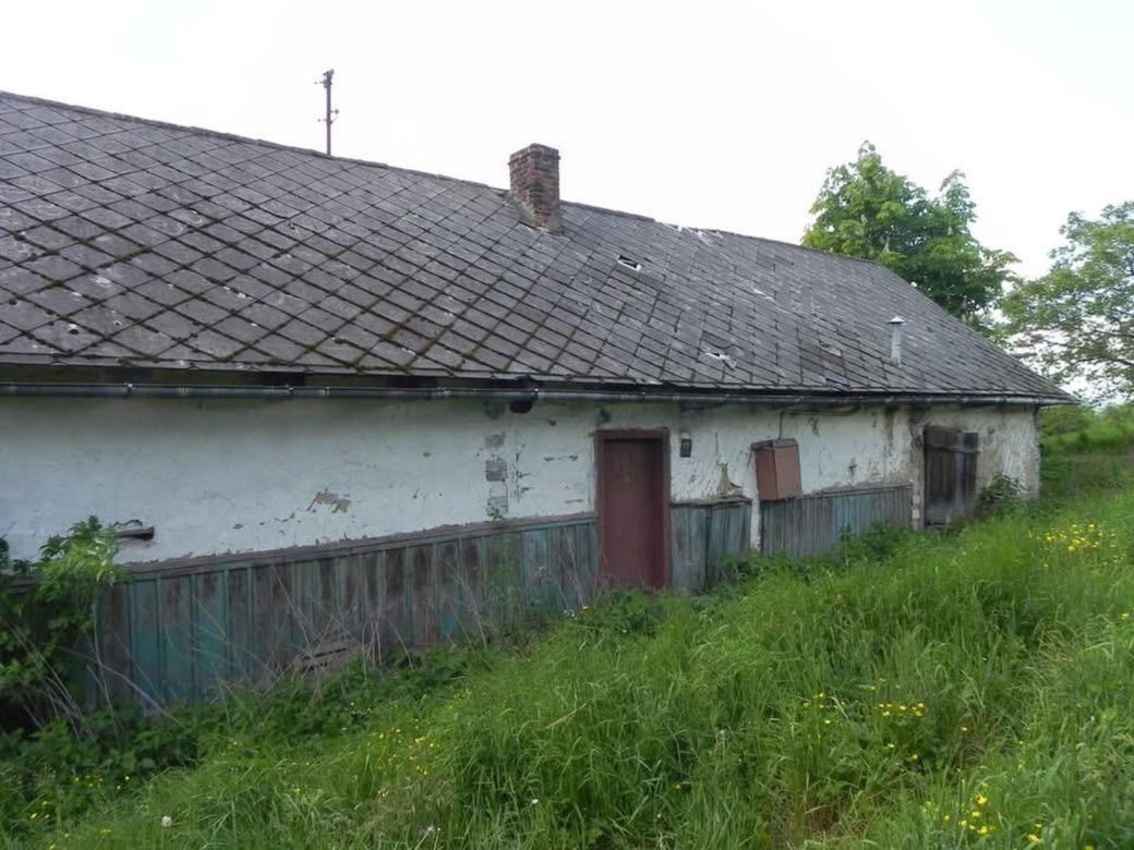 Remont drewnianej chaty w Bełdnie