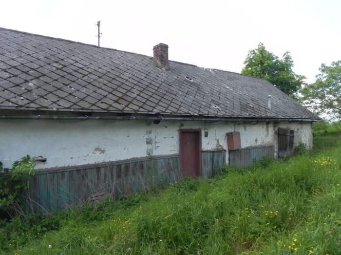 Remont drewnianej chaty w Bełdnie