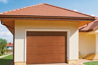Bramy garażowe z paneli o strukturze smoothgrain i sandgrain