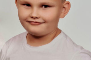 Mama zemdlała, w domu ulatniał się czad. 7-letni Filiip chwycił za telefon