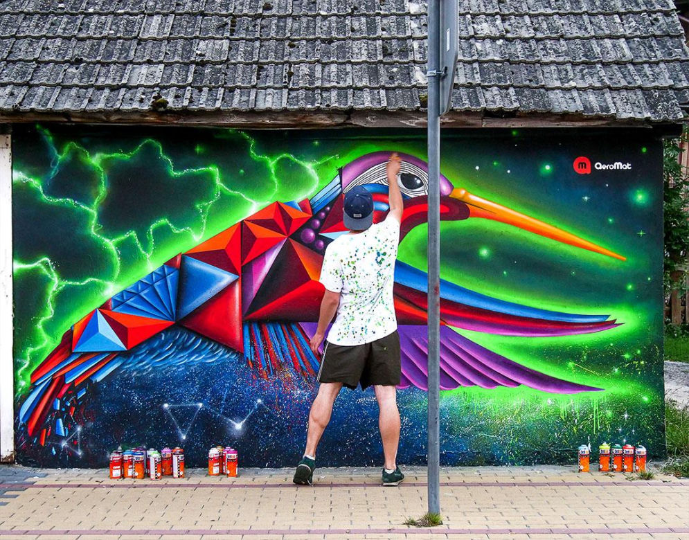 Artysta-grafficiarz. AeroMat z Lublina tworzy murale w miejskiej przestrzeni